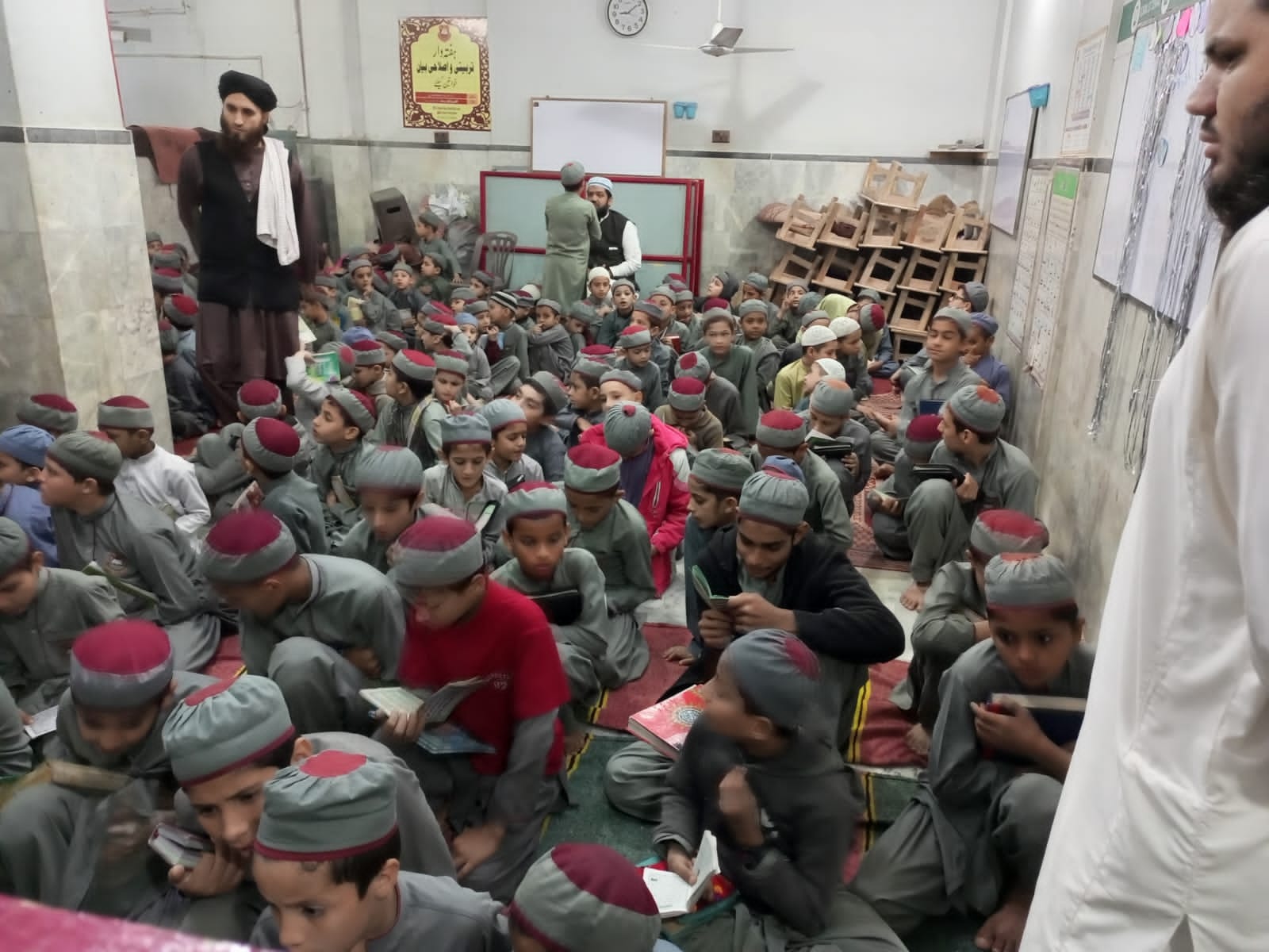 Dog sitting in a yellow kayak